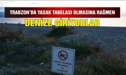 Trabzon'da yasak tabelası olmasına rağmen denize giriyorlar
