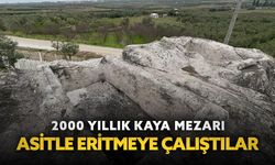 2000 yıllık kaya mezar asitle eritmeye çalıştılar