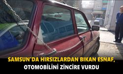 Samsun'da hırsızlardan bıkan esnaf, otomobilini zincire vurdu