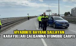 Viyadükte bayrak sallayan karayolları çalışanına otomobil çarptı