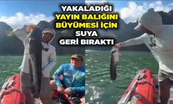 Avcıdan örnek davranış: Yakaladığı yayın balığını büyümesi için suya geri bıraktı