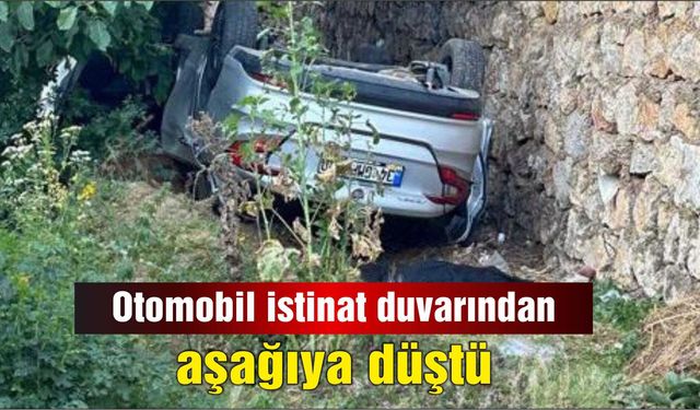 Otomobil istinat duvarından aşağıya düştü